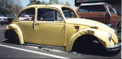 Stripped yellow Bug, side view